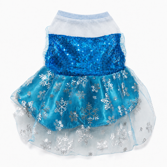A pet dress costume with a blue sequined waistband, a tiered tulle skirt in light blue and white with silver snowflake patterns, and a white ribbed neck trim, shown on a white background.
